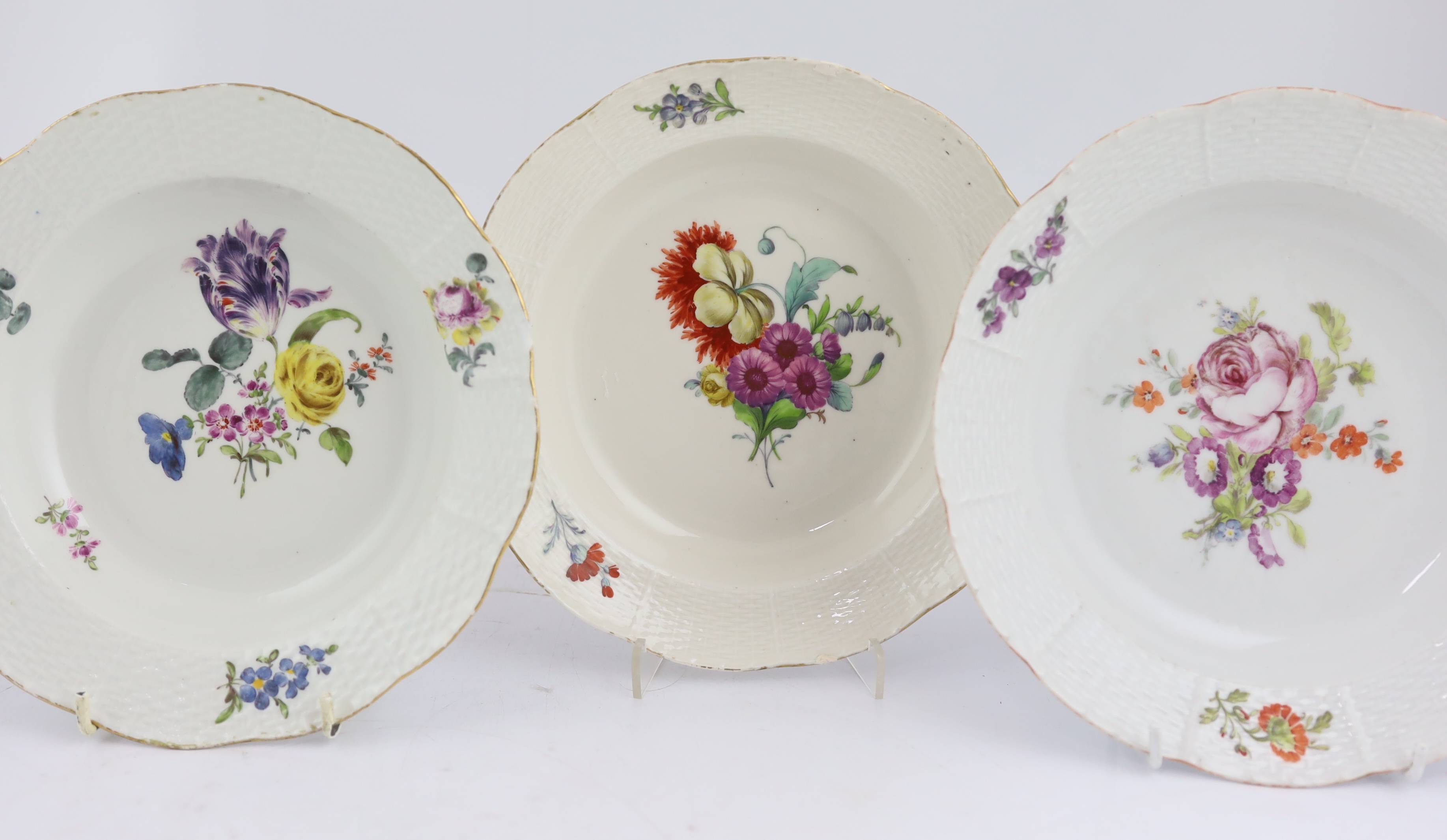 Three Russian Imperial porcelain soup plates from Catherine the Great (1762-96) ‘Everyday Service’ and one similar Meissen soup plate